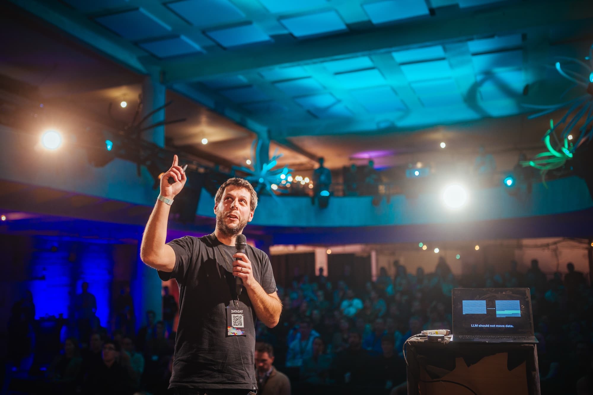Matouš Havlena on stage at a conference in Prague
